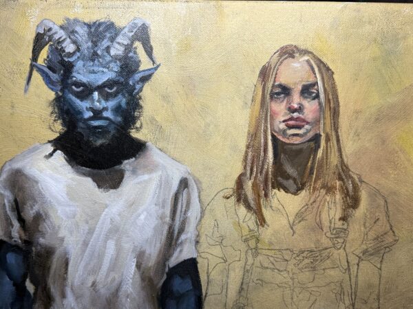 Defiance in progress with both faces painted and the woman’s clothing still outlined